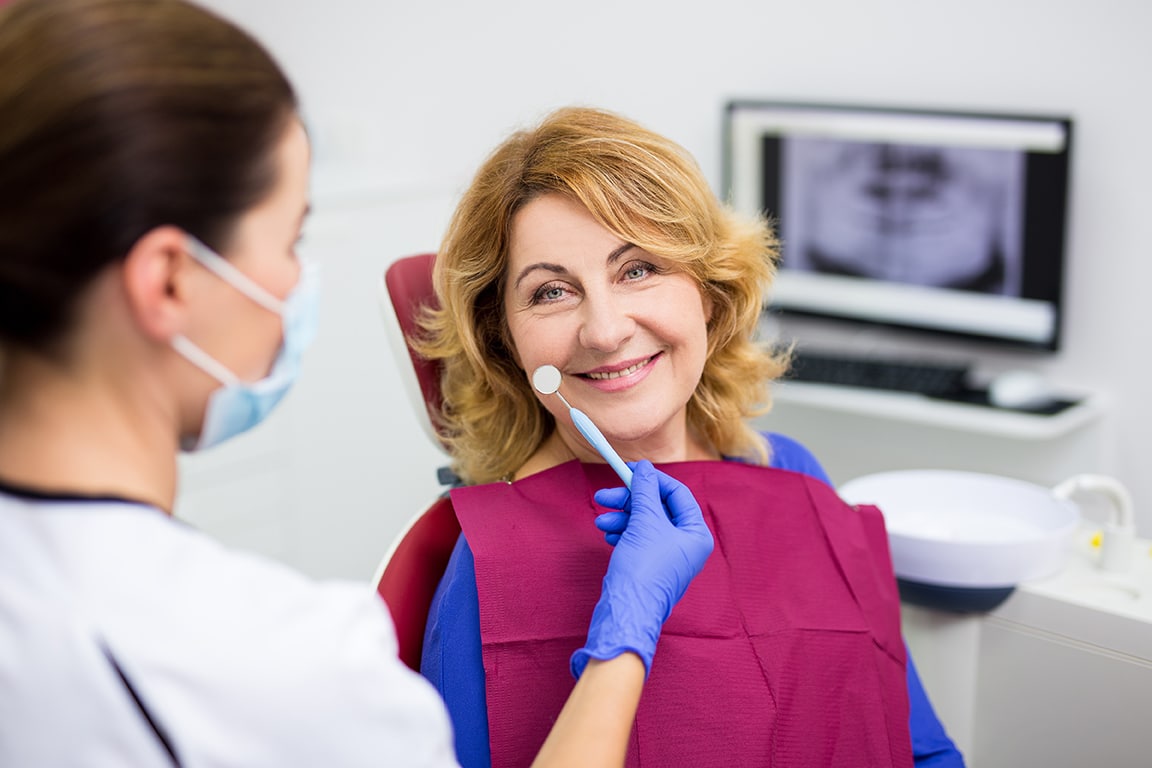 woman during cosmetic dental appointment in franklin tn at kelly family dentistry