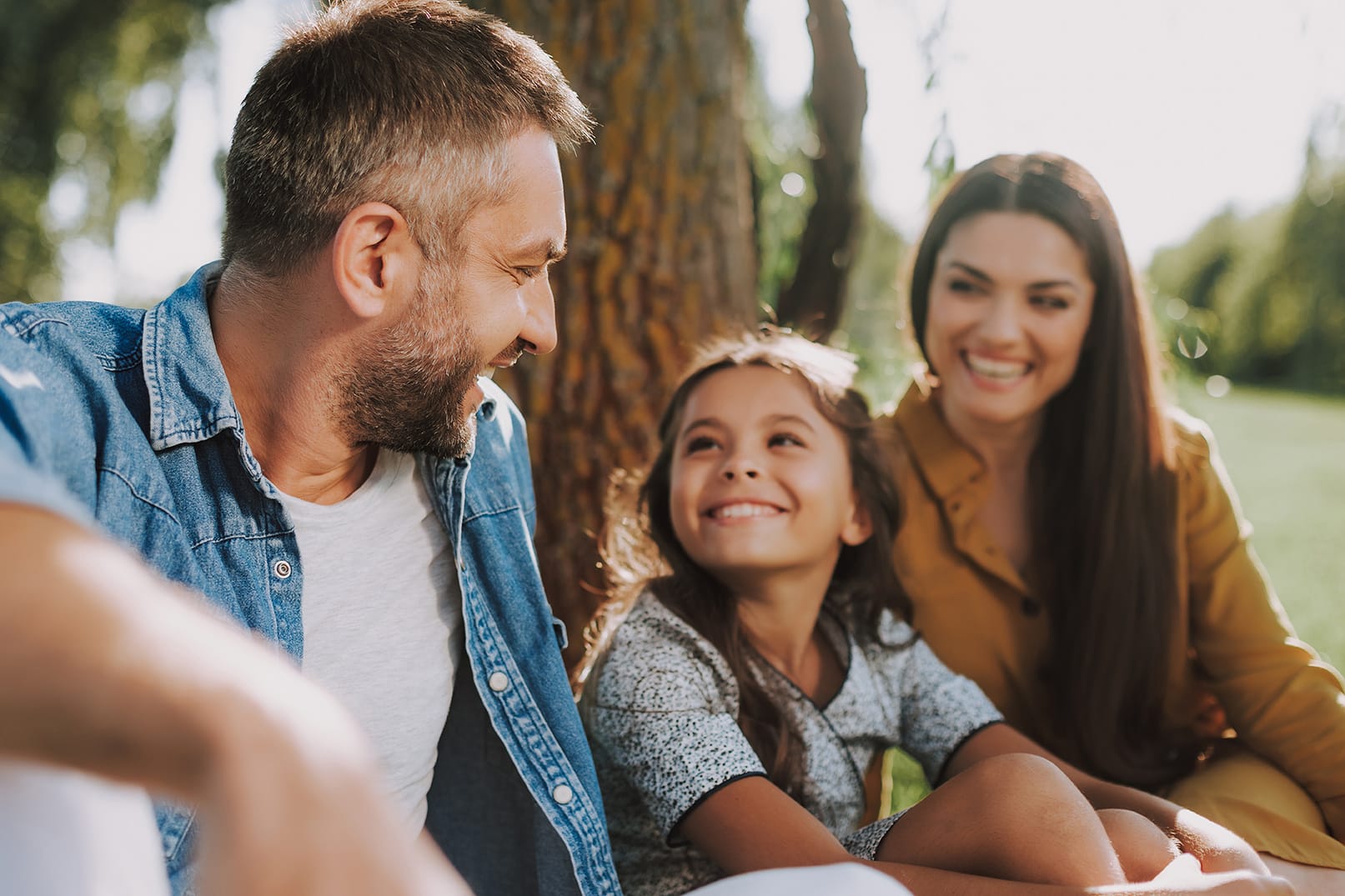 family laughing outside in franklin tn