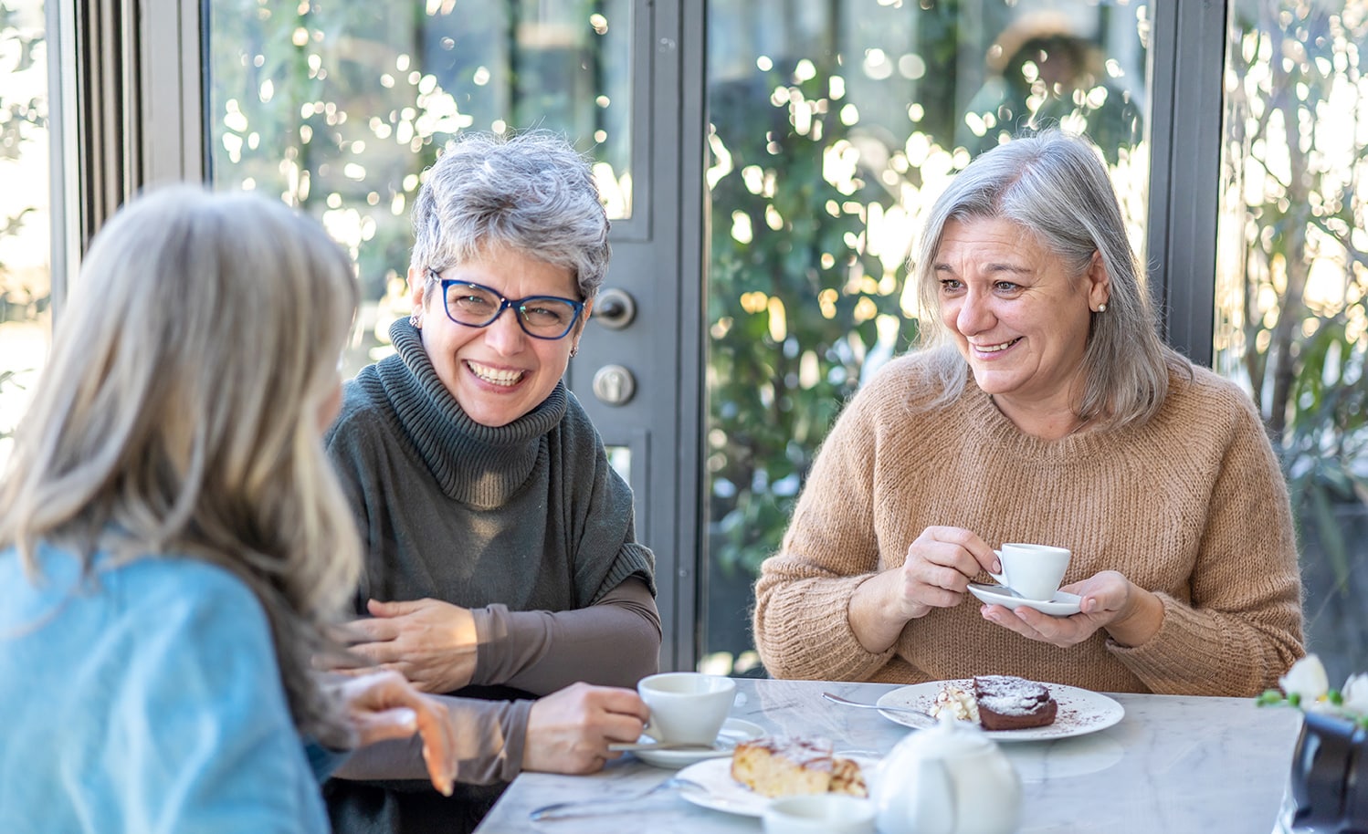 group of senior dental patients smiling in franklin tn