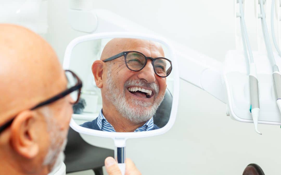Happy man smiling with his new dental implants in Franklin TN
